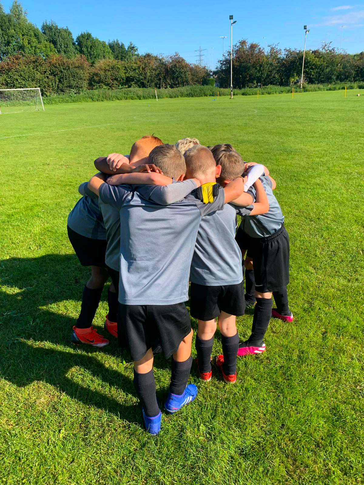 Group huddle and chat before the football game starts